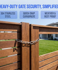 Chain Link Gate Latch with Double Carabiner Ends Stainless Steel securing wooden fence with quick-snap carabiners.