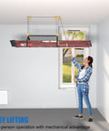 Person using Ladder Storage Pulley Hoist Self Locking Hanger For Garage Ceiling Lift System Holds 100 Lb, Fits 10 To 18 Foot Ceilings