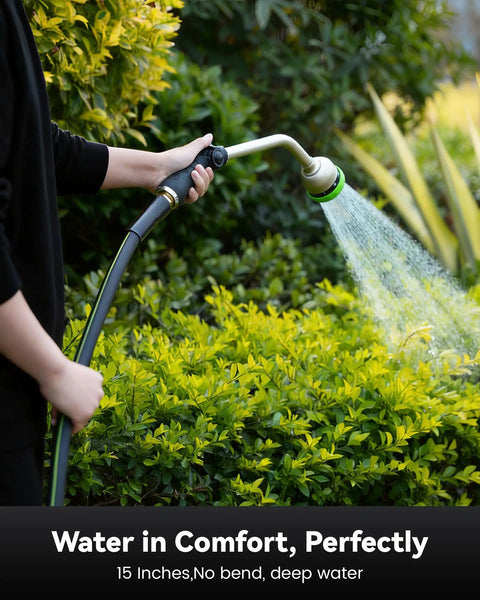 Person using Heavy-Duty 16-Inch Garden Hose Wand with 9 Spray Patterns to water shrubs, leak-free and easy to grip nozzle