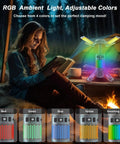 Rechargeable Telescopic Camping Lantern With Stand And Magnetic Base 12000mAh Power Bank RGB Lighting next to person reading in tent