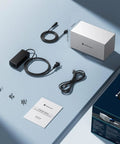 Four Bay USB C External Hard Drive Enclosure For 2.5 And 3.5 Inch SATA HDD Or SSD Drives with cables, power adapter, and manual.