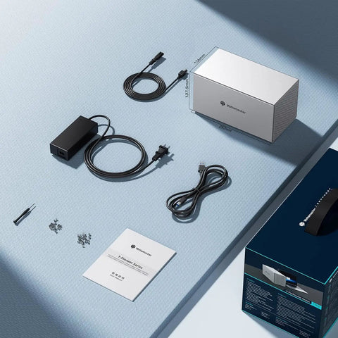 Four Bay USB C External Hard Drive Enclosure For 2.5 And 3.5 Inch SATA HDD Or SSD Drives with cables, power adapter, and manual.