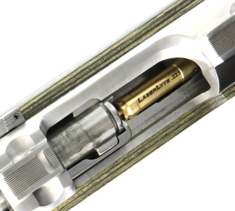 Multi Caliber Laser Bore Sight Kit With Bright Red Cartridge Sighter For Zeroing Rifle Scopes And Aligning Iron Sights showing brass laser cartridge in firearm chamber.