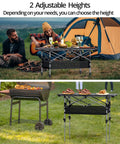 Three Foot Roll Top Aluminum Camping Table With Two Adjustable Heights, Lightweight Fold Up Design With Storage Net For Tailgates, Backyard BBQs, And Picnics, 32.2 By 16 Inches, Black shown in outdoor settings with food and drinks.
