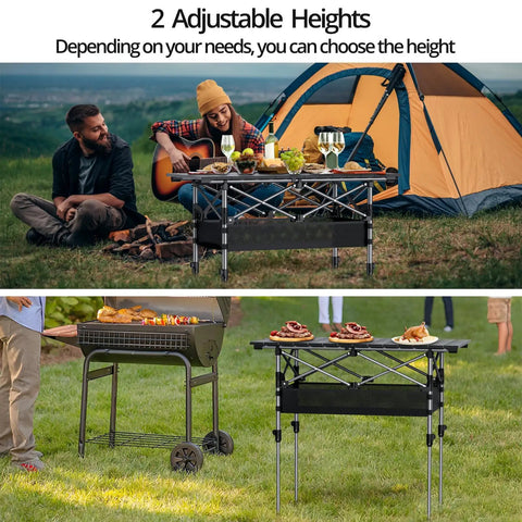 Three Foot Roll Top Aluminum Camping Table With Two Adjustable Heights, Lightweight Fold Up Design With Storage Net For Tailgates, Backyard BBQs, And Picnics, 32.2 By 16 Inches, Black shown in outdoor settings with food and drinks.