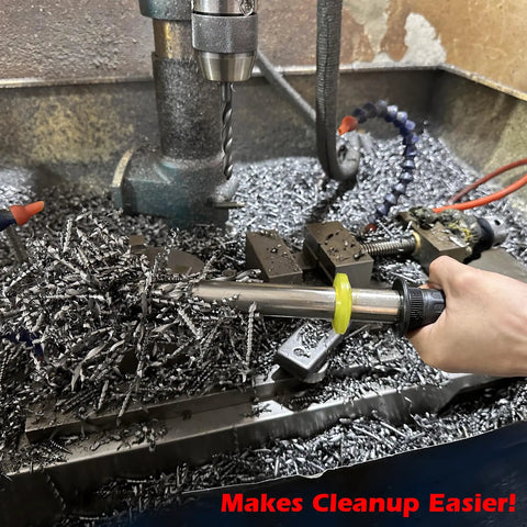 No Sweat Neodymium Shop Magnet Wand With Telescoping Pole and Snappy Release Trigger cleaning metal shavings from a workbench.