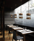 Retro Industrial Round Cage Pendant Light With Metal And Wood Frame, 1 Light Chandelier in dining room setting, brown finish, four units.