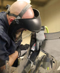 Technician using Beast Power Air Die Grinder With 25,000 RPM and 0.4 HP on auto part in workshop setting.