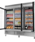 Sleek Stainless Steel Commercial Beverage Cooler With Tempered Glass Front And Bright Led Strip Badass Upright Drink Fridge Plug And Play 78 Cubic Feet For Shop Or Bar displaying drinks and pastries.