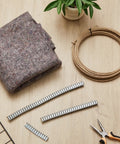 No Sweat Upholstery Spring Repair Kit For Couch Sofa Furniture Includes Sweet Twenty Four By Six Inch Spring Cover Pad and clips.