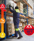 Worker reaching for a box in a freezer, wearing Heavy Duty Insulated Freezer Work Coveralls Built To Blast Through The Deep Freeze With Rock Solid Thermal Armor And Water Repellent Winter Job Gear For Cold Storage Crews.
