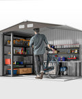 Interior view of 9x6 Outdoor Metal Storage Shed With Foundation Kit, showing shelves, tools, and a bicycle inside.
