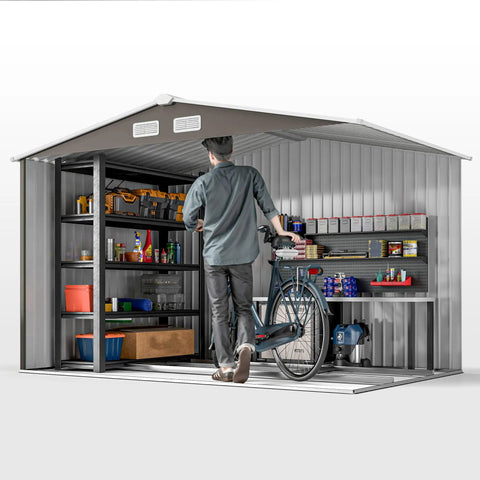 Interior view of 9x6 Outdoor Metal Storage Shed With Foundation Kit, showing shelves, tools, and a bicycle inside.