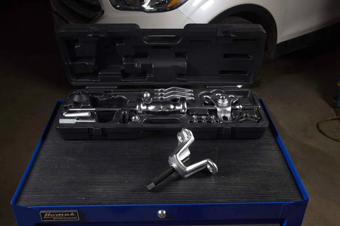 9 Way Slide Hammer Puller Set Heavy Duty Black Finish With Internal And External Jaws, tools displayed in open case on workbench