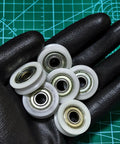 6 Pack Nylon UGroove Track Roller Wheels Set With 608ZZ Sealed Ball Bearings 8x30x9mm For Sliding Doors Windows And Lifting System Pulleys Built To Last Dope Smooth Quiet Operation, shown on gloved hand