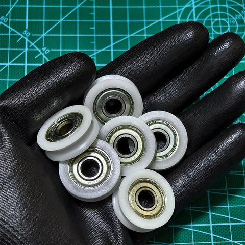 6 Pack Nylon UGroove Track Roller Wheels Set With 608ZZ Sealed Ball Bearings 8x30x9mm For Sliding Doors Windows And Lifting System Pulleys Built To Last Dope Smooth Quiet Operation, shown on gloved hand