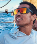 Man wearing Go-To Safety Sunglasses With Polarized Mirror Lenses ANSI Z87 Plus Certified UV 400 Protection Black Frame