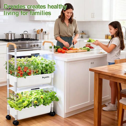 Woman and girl with movable two layer indoor hydroponic garden system with 54 pods and 30W LED grow light beside kitchen counter