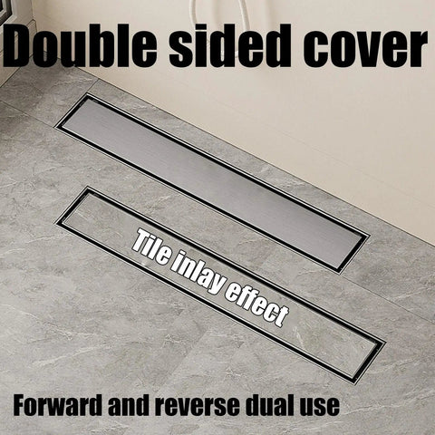 Heavy Duty Brushed Stainless Steel Linear Shower Drain With Reversible Cover And Removable Grate For Custom Tile Trim And Slick Low Profile Bath Floor Drainage, showing double-sided cover on tile floor.