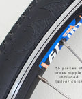 Close-up of bike wheel with European Made 14G Stainless Steel Bike Spokes 36 Pack With Brass Nipples J Bend kit installed.