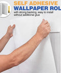 Person installing Top Shelf 5Mm Thermal Foam Peel And Stick Wallpaper Roll with strong backing for easy application.