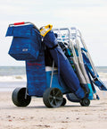 All-Terrain Foldable Beach And Utility Cart With 10 Inch Wheels, Holds 48 Quart Cooler And Four Chairs, on sandy beach