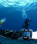 Scuba diver wearing Quad Ci Wrist Dive Computer With Customizable ZH-L16C Algorithm For Your Personal Dives underwater
