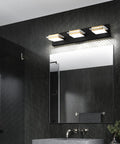 Black 4 Light Vanity LED Bathroom Light Fixture For Modern Homes mounted above mirror in stylish black bathroom