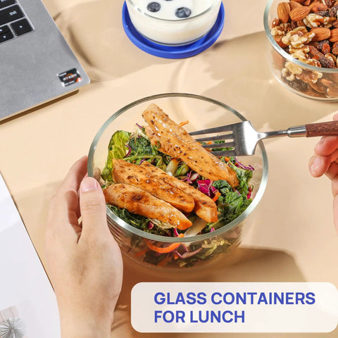 Glass Bowls Set Of Four With Lids, 1, 2, 4 And 7 Cup Sizes, shown with salad for lunch, clear glass for easy viewing