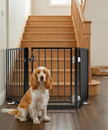 Extra Wide 60 Inch Free Standing Dog Gate For Home Doorways Rock Solid Metal Pet Fence with large dog and staircase backdrop.
