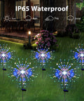 Solar Garden Firework Lights 6 Pack Waterproof Outdoor 120 LED Sparklers illuminating a rainy patio and garden at night.