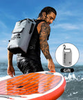 Man with floating waterproof dry bag backpack 20L kayaking, heavy duty 500D vinyl with welded seals, on river or lake adventure