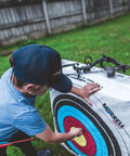 Child using Lightweight Outdoor Archery Target Bag For Youth And Kids Range With Two Sides And Four Shooting Spots NASP Field Point Training Target