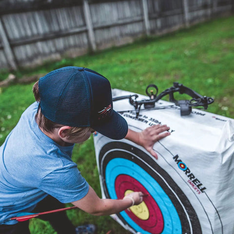 Child using Lightweight Outdoor Archery Target Bag For Youth And Kids Range With Two Sides And Four Shooting Spots NASP Field Point Training Target