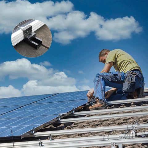 Person installing Heavy Duty Solar Panel End Clamps 10 Pack Fits 30 To 35 Millimeter Roof Mounts on solar panel system.