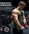 Man using Wrist Wraps For Weightlifting With Thumb Loops Heavy Duty Wrist Support Straps For Powerlifting And Crossfit 12 Inch And 18 Inch Options Black in gym.