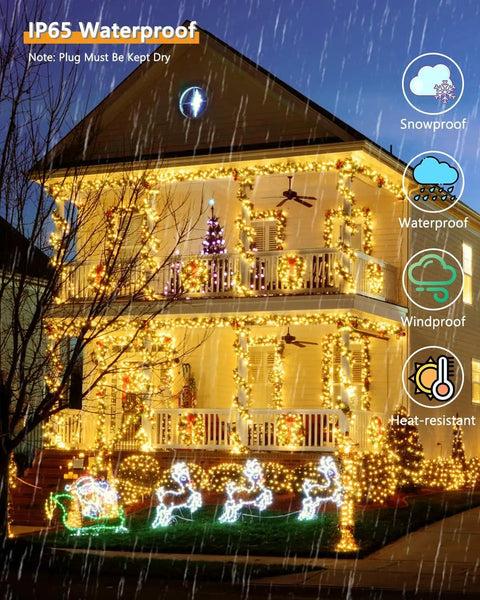 2Pack 500LED Solar String Lights Outdoor Waterproof 180FT With 8 Modes IP65 Warm White Twinkle illuminating house in rain