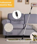 Top Shelf 36 Inch Heavy Duty Dust Mop For Hardwood Floors Featuring Absorbent Pad And Quick Grip Handle near a sofa showcasing its telescopic aluminum pole and washable pad.