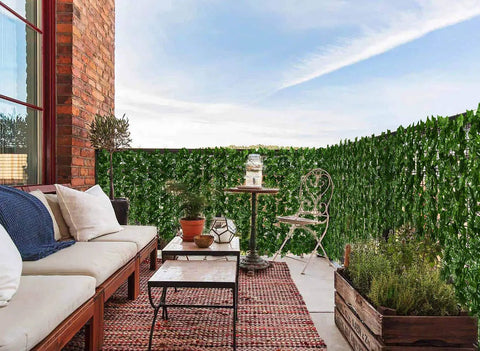 Artificial Ivy Privacy Fence Screen 118 By 39.4 Inches For Outdoor Walls And Garden Decor around a cozy patio area.