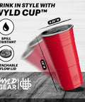 Red 24 Oz Insulated Stainless Steel Party Cup With Lid No Sweat Double Wall Vacuum Insulated Tumbler on table