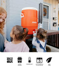10 Gallon Portable Sports Cooler And Beverage Dispenser With Flat Seat Lid in use by children outdoors, orange and white design.