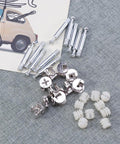 24 Pack White Cam Lock Fittings For Furniture Connectors And Fixing Screws Pro Grade No Fuss Corner Joints laid out on fabric