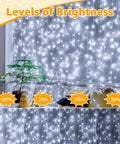 Outdoor 800 LED Christmas String Lights 262 Feet With Remote 8 Modes dimmed on wall with brightness levels 100%, 75%, 50%, 25%