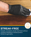 Hand using Cut To Size Staining Pads 2 Pack With Micro Brush Material for streak-free finish on wood surface.