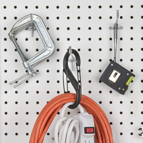 Dual Gate S Shaped Plastic Carabiner With Two Clips For Keys And Gear hanging on pegboard with tools and cables