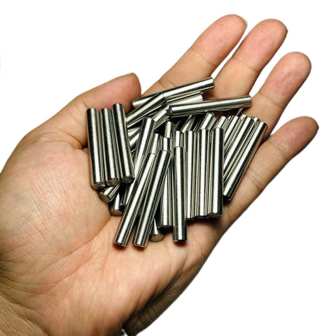 Hand holding 35 Pieces 6mm By 40mm Dowel Pins Set In Stainless Steel 304 For Shelves, Bunk Beds And Wood Projects, M6 Round Pegs