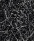 Hassle Free Black Crinkle Cut Paper Shred Filler For Gift Baskets And Boxes Smooth Cushion Wrapper in textured black strips.
