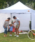 Family enjoying outdoor gathering with gazebo secured by 11 Inch Tent Stakes 10 Pack Heavy Duty Ground Anchors for Outdoor Camping and Gazebo Setup.