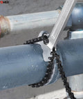 24 Inch Chain Wrench With 6.3 Inch Pipe Capacity Heavy Duty Chromium Vanadium Steel gripping a pipe for maintenance