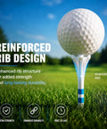 Golf ball on a tee from 170 Pack Five Prong Plastic Golf Tees Set In Three Sizes Three And A Quarter Inch Two And Three Quarters Inch One And A Half Inch White Pro Grade Distance And Stability With Friction Reducing Impact Ribs in field with text 'Reinforced Rib Design'